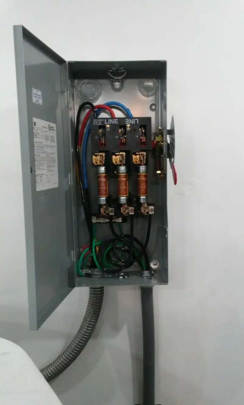 Three-phase disconnect switch installed for Smoke Detector Installation in Moline